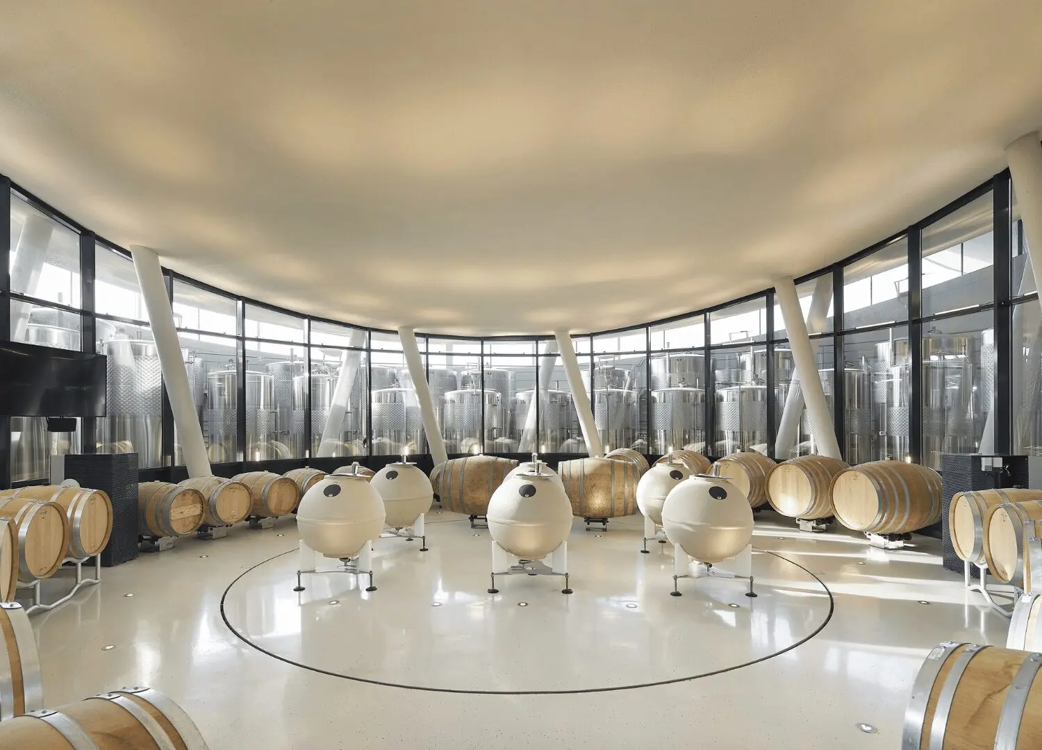 15. Tokaj, Hungary features several unique egg-shaped fermentation vessels arranged on its polished floor.