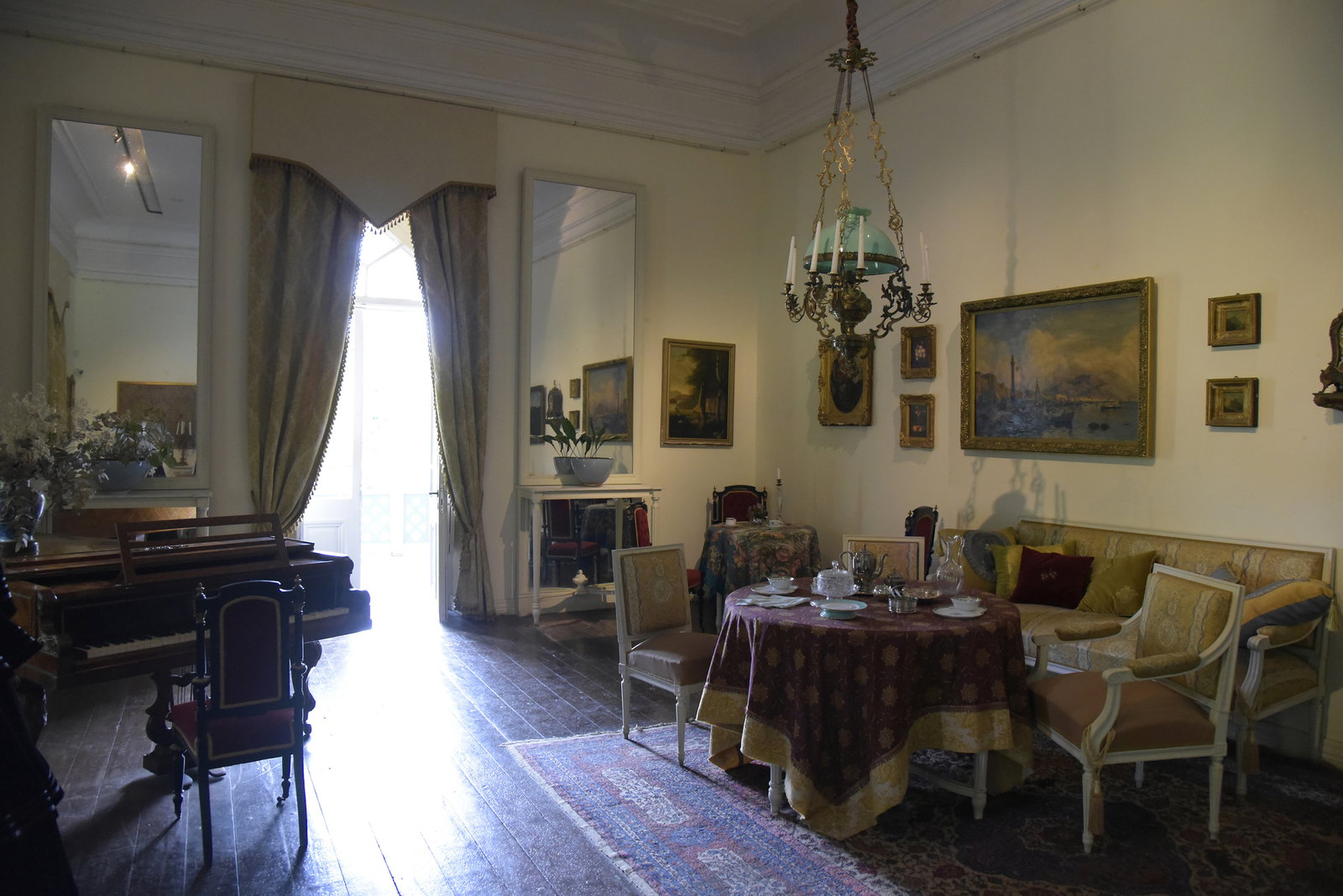 2. Kakheti, Georgia, showcases an ornate chandelier with a distinctive light blue glass shade.