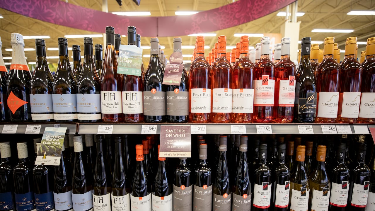 A British Columbia provincial liquor store wine aisle with various imported wine selections on display.