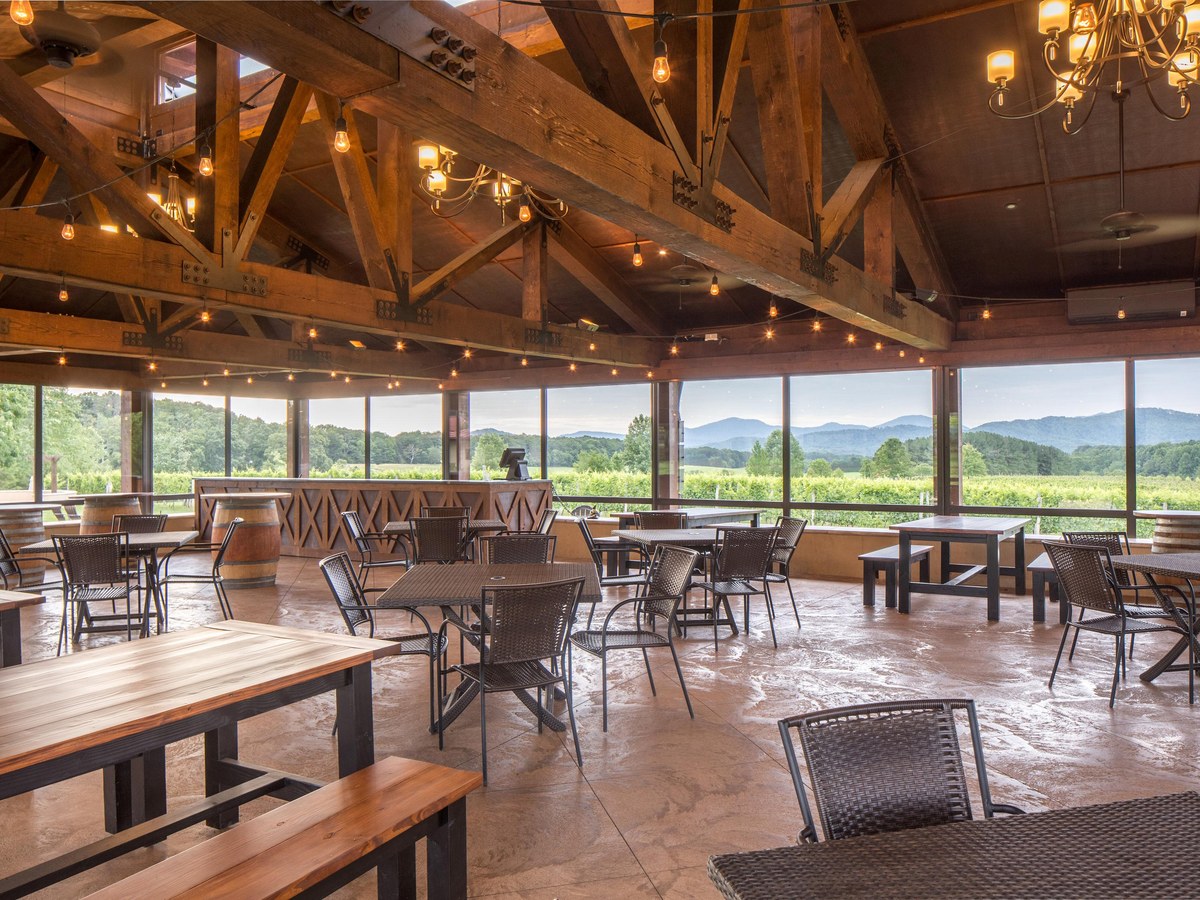 Afton Mountain Vineyards offers a spacious tasting room with vineyard and mountain views, perfect for Monticello Cup visitors.
