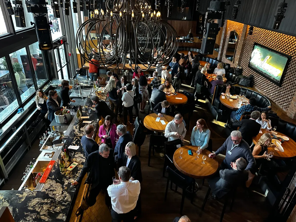 6. Vancouver International Wine Festival (Canada) features a large, ornate circular chandelier.