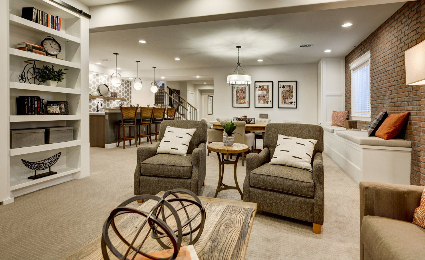 The Lower Level offers an inviting open layout, seamlessly connecting various cozy zones.