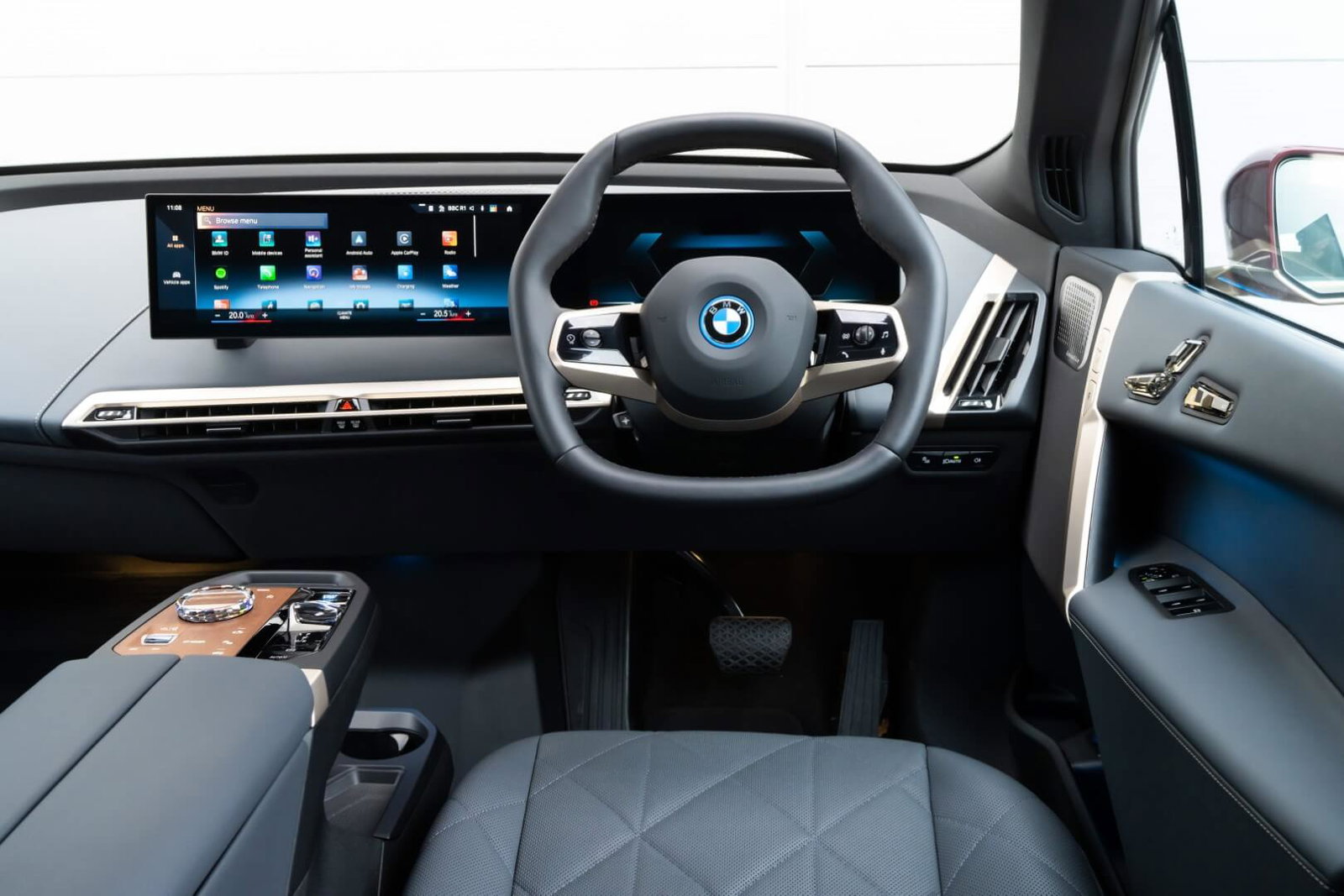 IX Estate features a prominent, curved digital display across its dashboard.