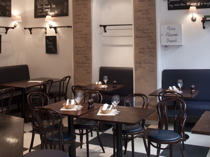 The 10 Cases in Covent Garden offers intimate dining with chalkboard menus and bentwood chairs.