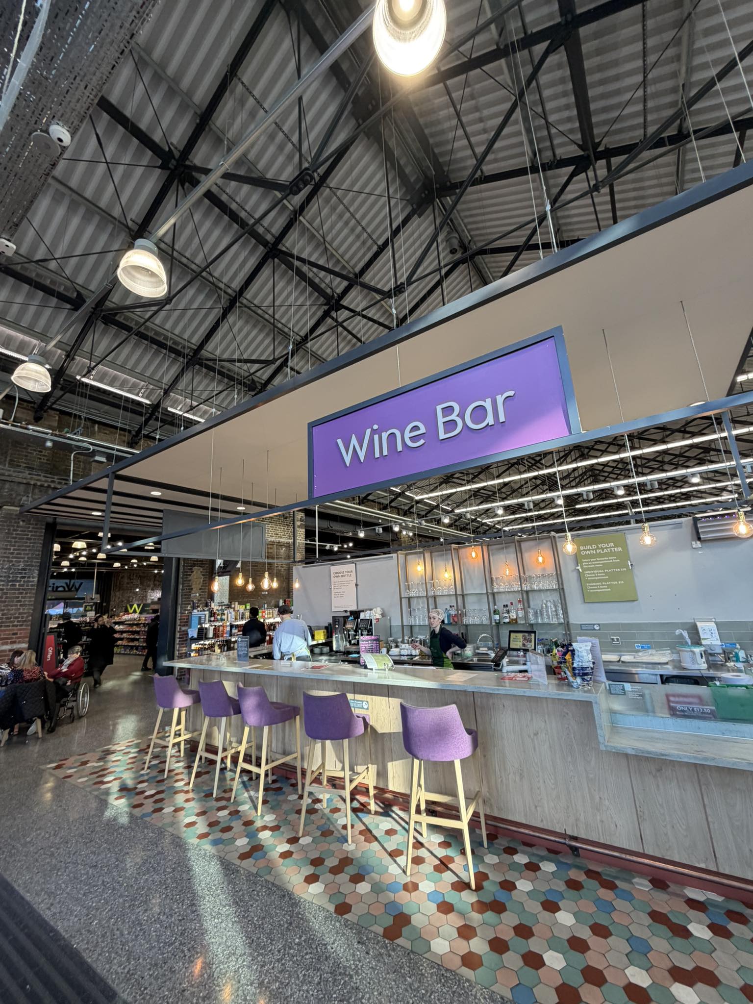 The Rule Aalia Wine Room Reportedly Breaks with its vibrant purple bar stools.