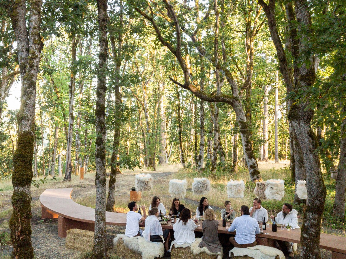 Antica Terra's Table in the Trees at Keeler Estate offers a rustic, elegant outdoor dining experience.