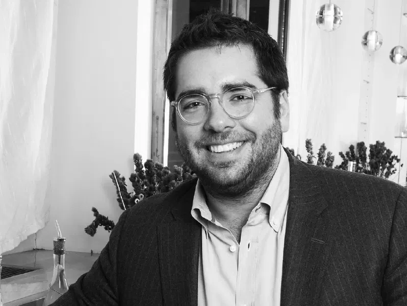 Michael Stillman, president and founder of Quality Branded Hospitality, smiles.