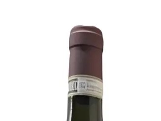 A magnum bottle of Bartolo Mascarello Barolo 2019, featuring a unique painted label, stands against a white background.