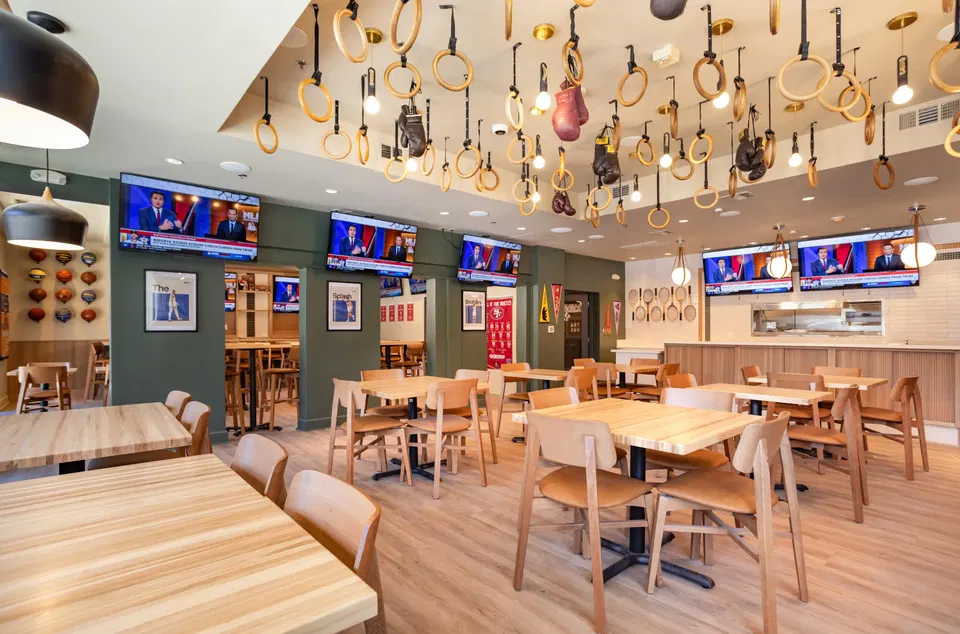 Piedays, Inner Richmond (San Francisco) features numerous gymnastic rings suspended from the ceiling.