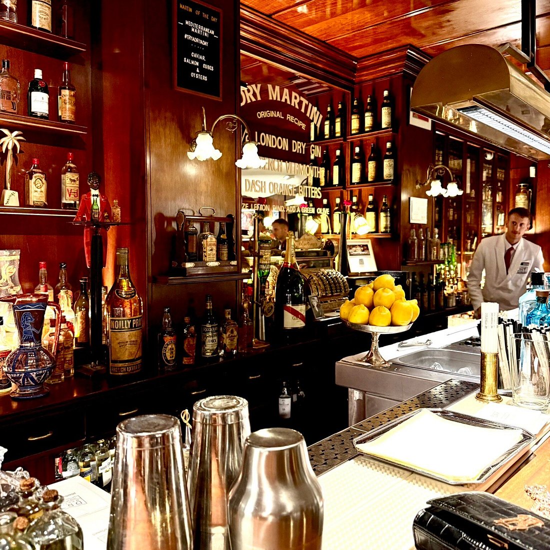 3. Dry Martini, featuring a classic bar counter lined with gleaming metal cocktail shakers.
