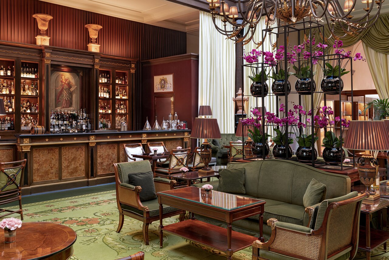 5. Atrium Bar (Four Seasons Hotel Firenze) features vibrant purple orchids adding a touch of color.