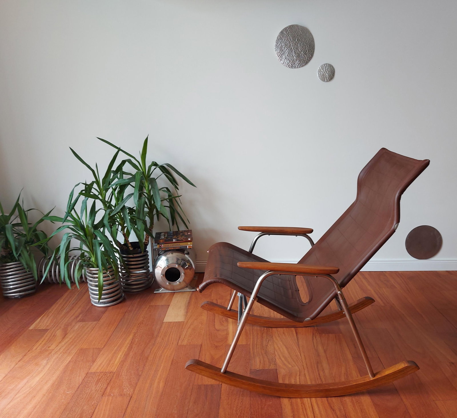 4. Bar Rocking Chair features a distinctive brown leather rocking chair.