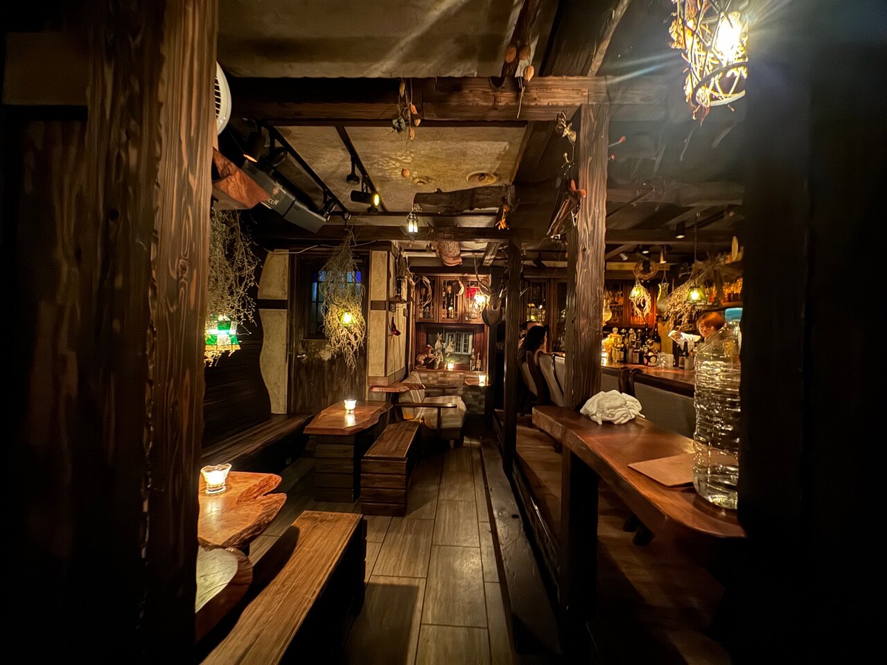 1. Bar Benfiddich (Shinjuku) is adorned with many hanging dried herbs, adding to its unique, rustic charm.