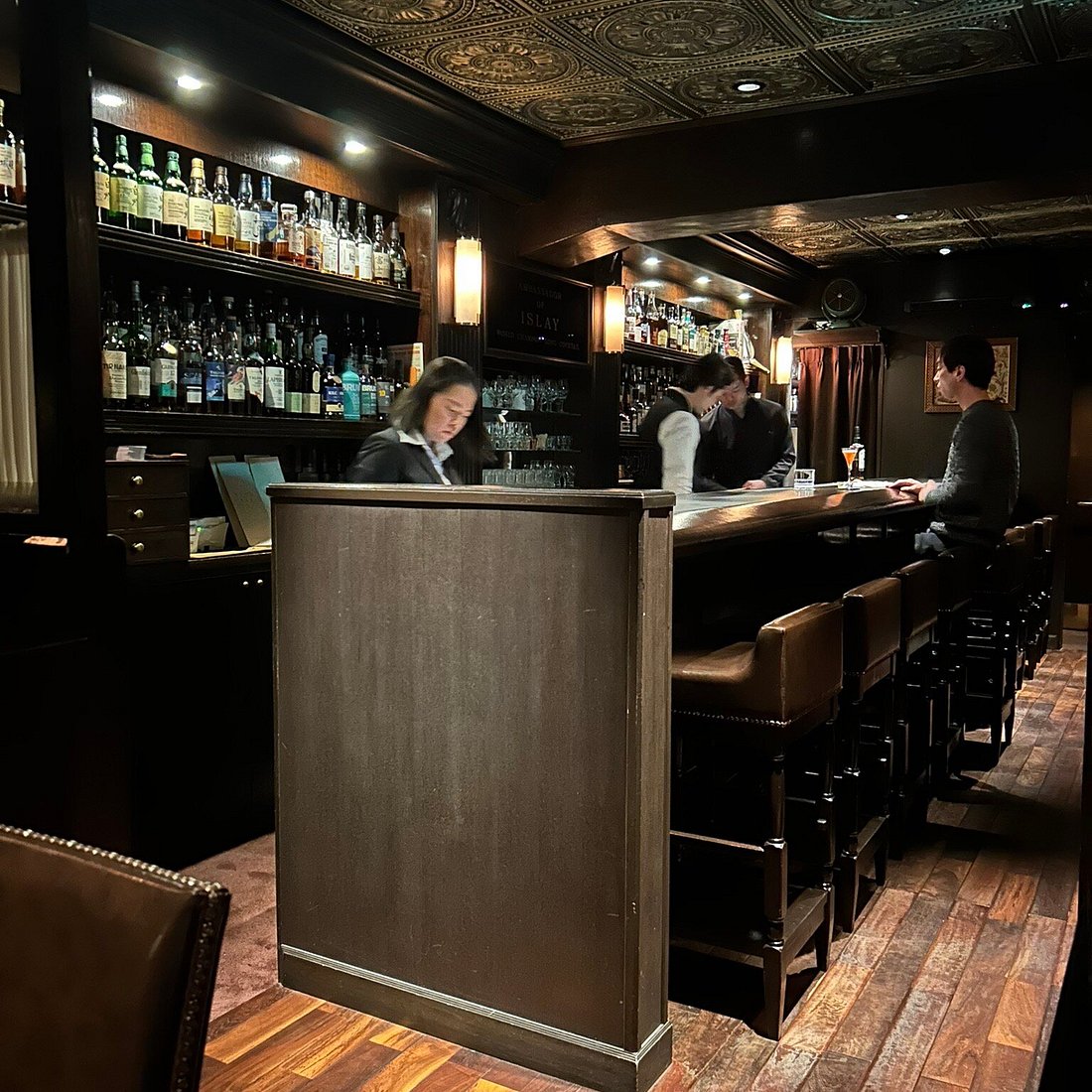 3. Star Bar (Ginza) features a distinctive, ornate patterned ceiling that adds to its classic charm.