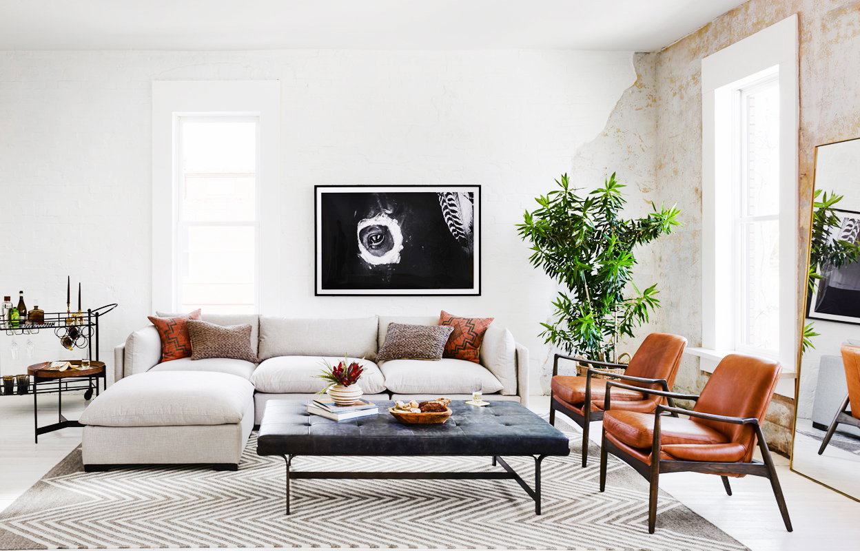 Seating Style features a comfortable light grey sectional sofa.