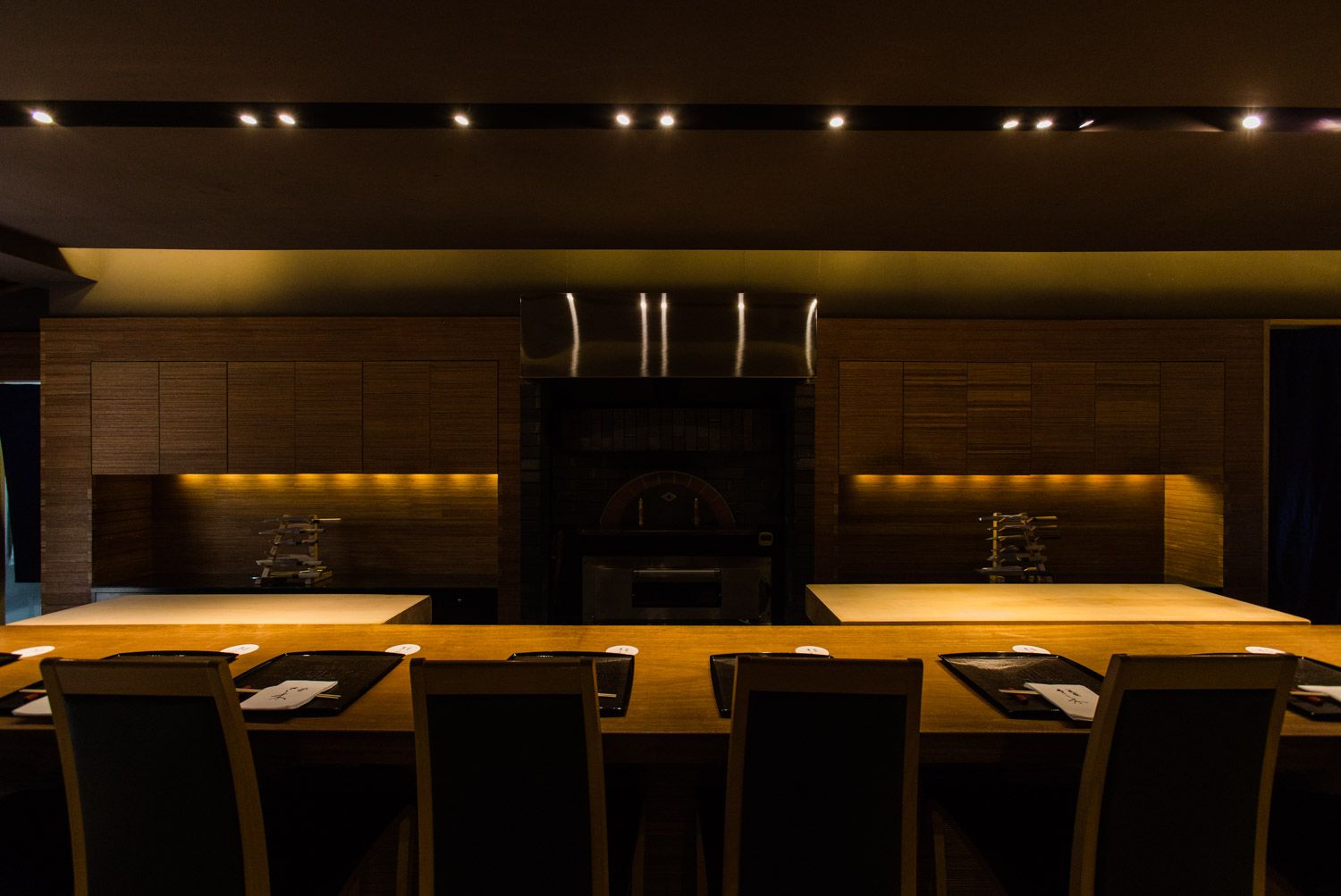6. Gion Sasaki features a striking brick oven as a central culinary element.