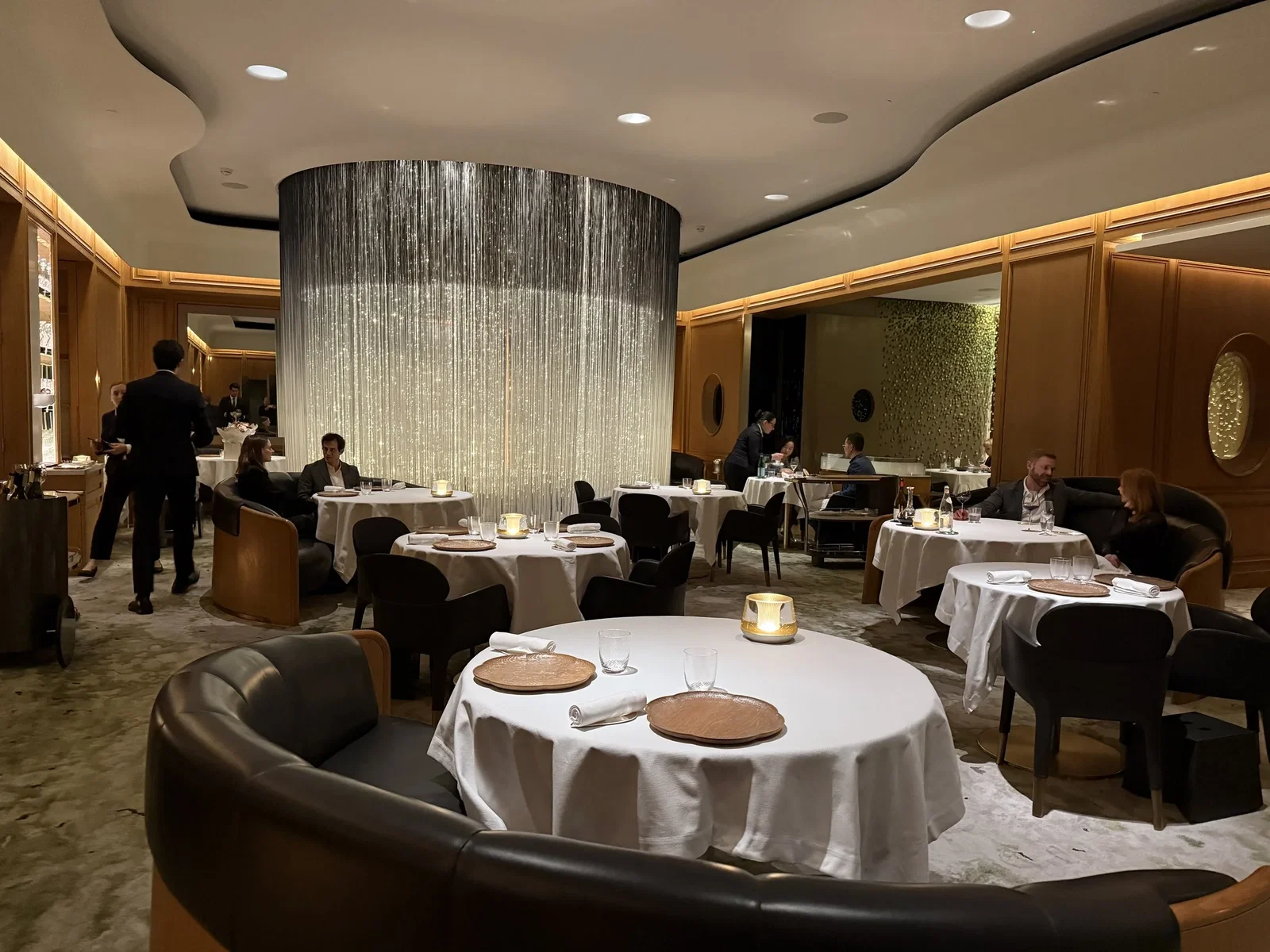 3. Alain Ducasse at The Dorchester features a striking, shimmering curtain that defines its luxurious interior.