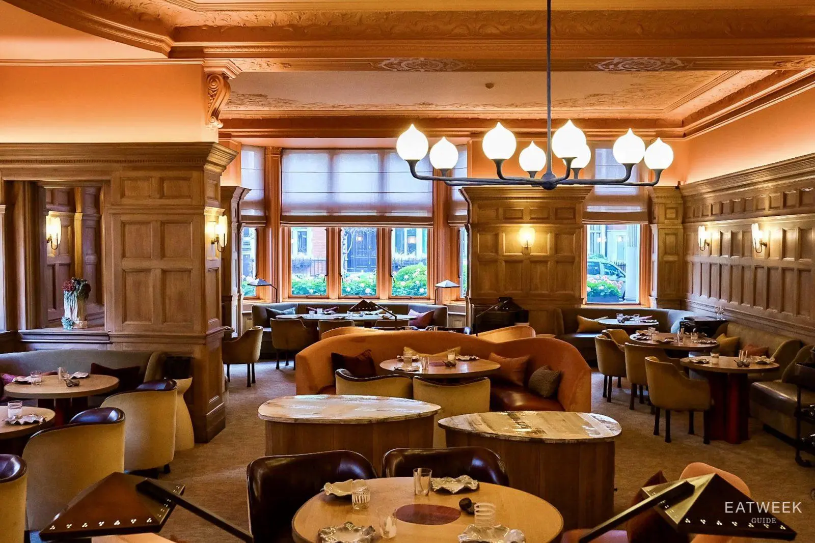6. Hélène Darroze at The Connaught features rich wood paneling throughout its elegant dining room.