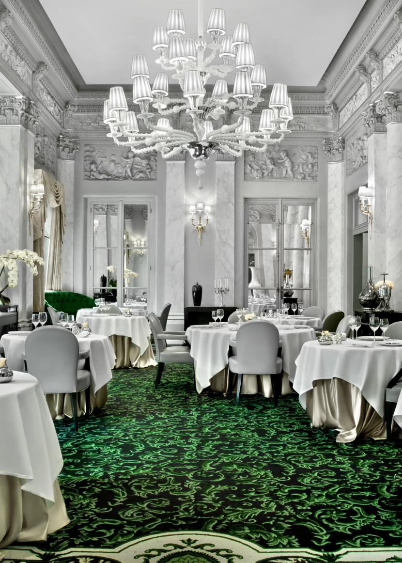 4. Le Pré Catelan features a striking green and black patterned carpet.