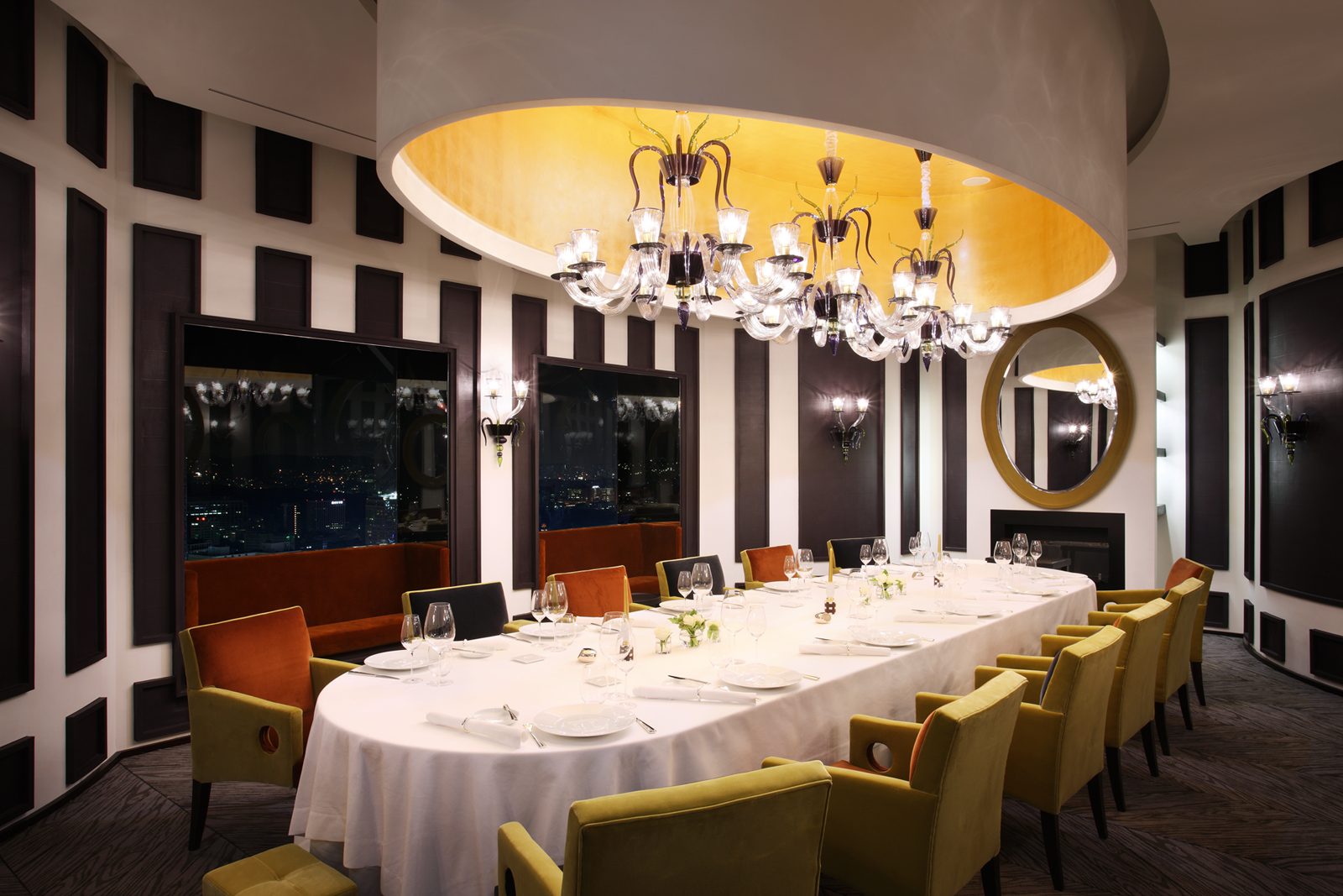 8. Pierre Gagnaire features an oval ceiling with elaborate glass chandeliers.