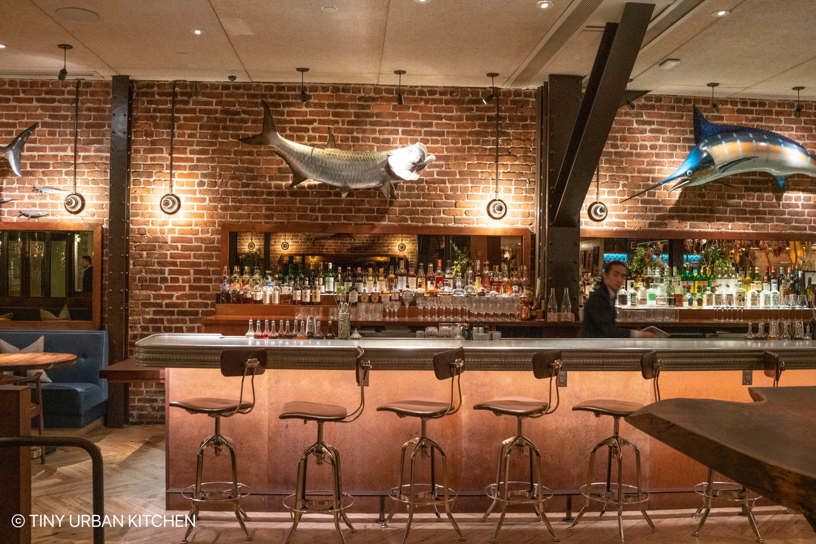 12. Angler SF features striking fish sculptures above its bar.
