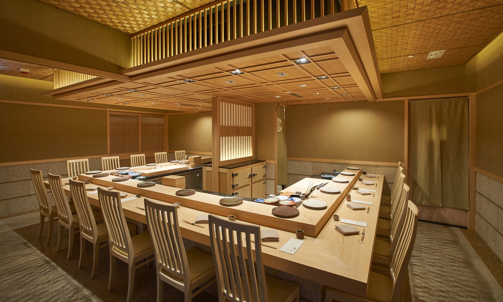 10. Sushi Saito's intricate woven ceiling design adds a unique textural element to the serene space.