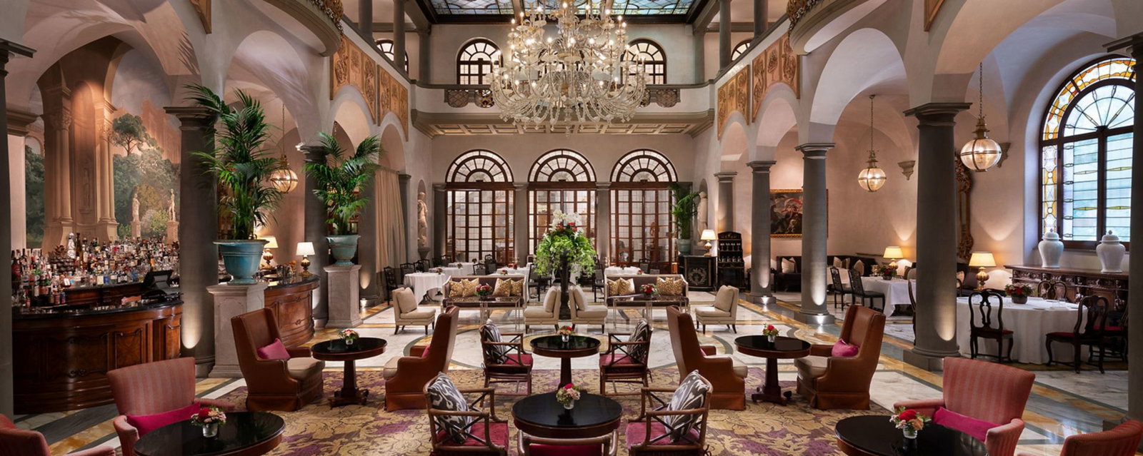 10. The St. Regis Florence showcases a magnificent crystal chandelier illuminating its grand, opulent lobby.