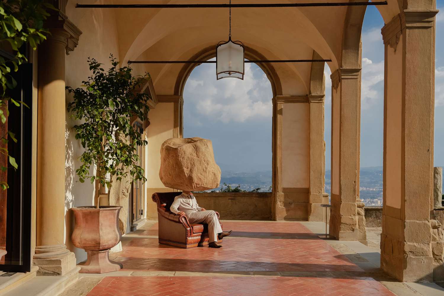 4. Belmond Villa San Michele displays a unique stone sculpture under its arches.