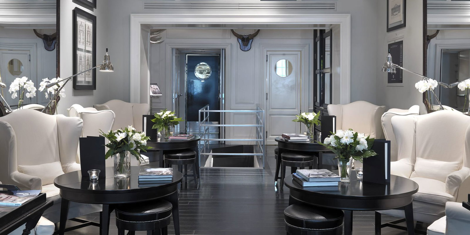 8. J.K. Place Firenze features distinctive doors with circular porthole windows.