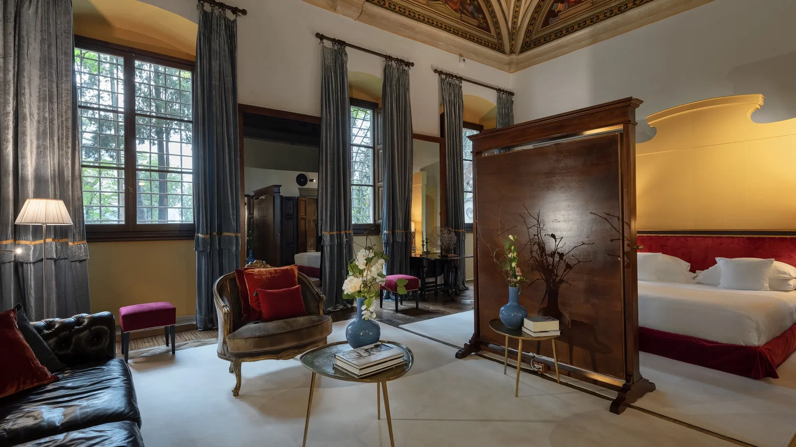 9. Il Salviatino features an exquisitely painted, vaulted ceiling that adds historical grandeur to the luxurious space.
