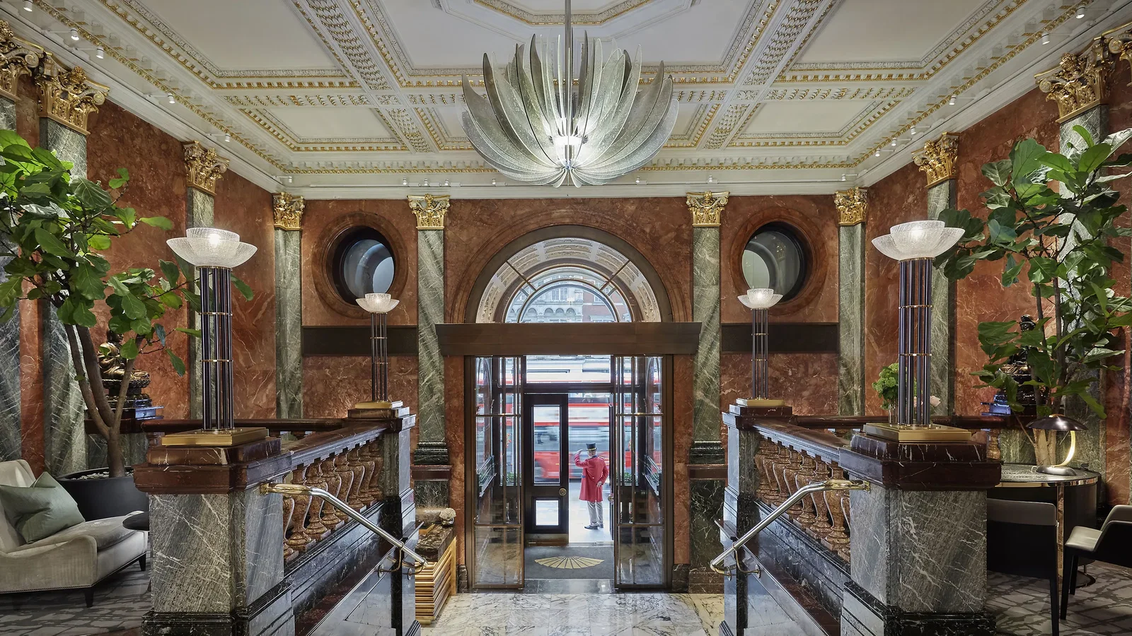 6. Mandarin Oriental Hyde Park showcases its opulent lobby with striking red and green marble walls.