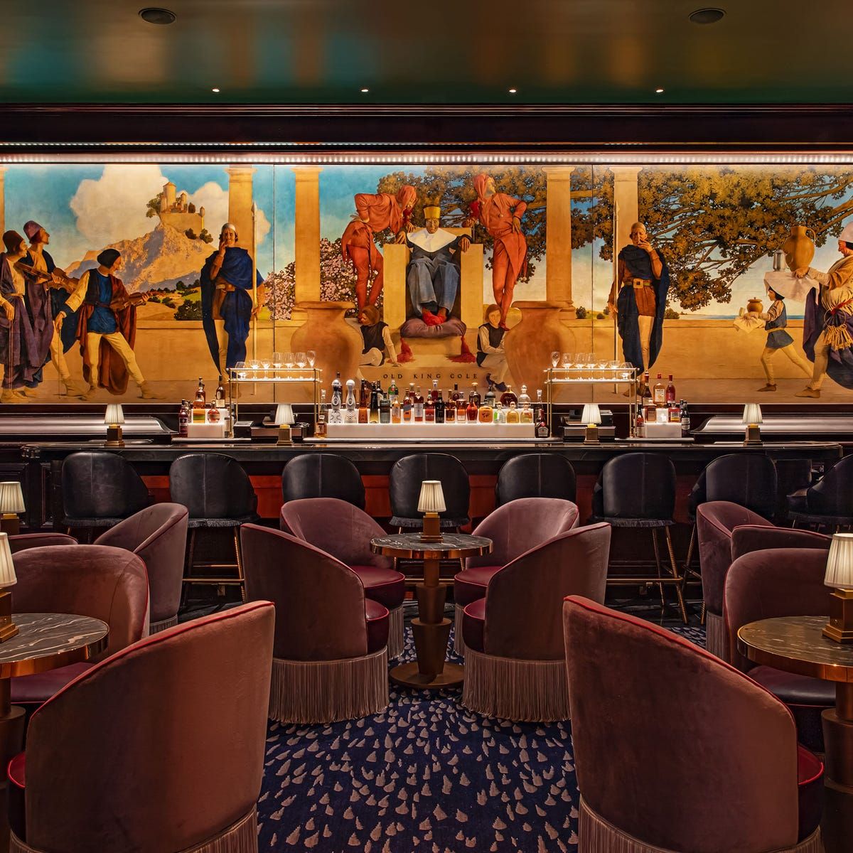 10. The St. Regis New York features a vibrant, expansive mural above its elegant bar.