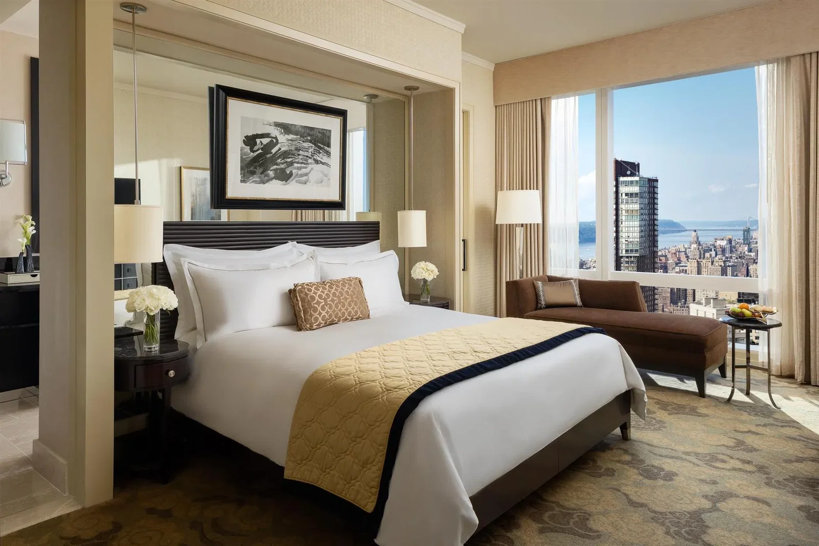 8. Mandarin Oriental, New York offers an expansive window with a breathtaking city skyline view.