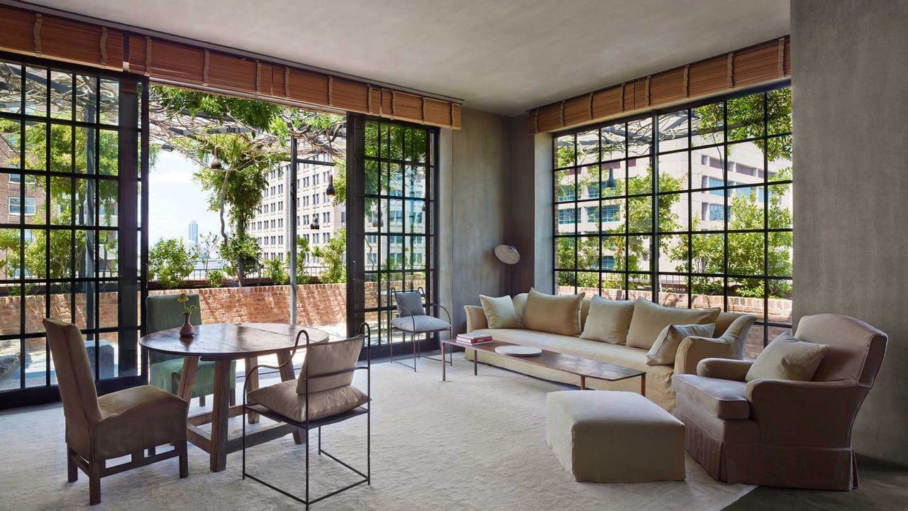 9. The Greenwich Hotel (Tribeca) features striking black-framed grid windows that invite the outdoors in.