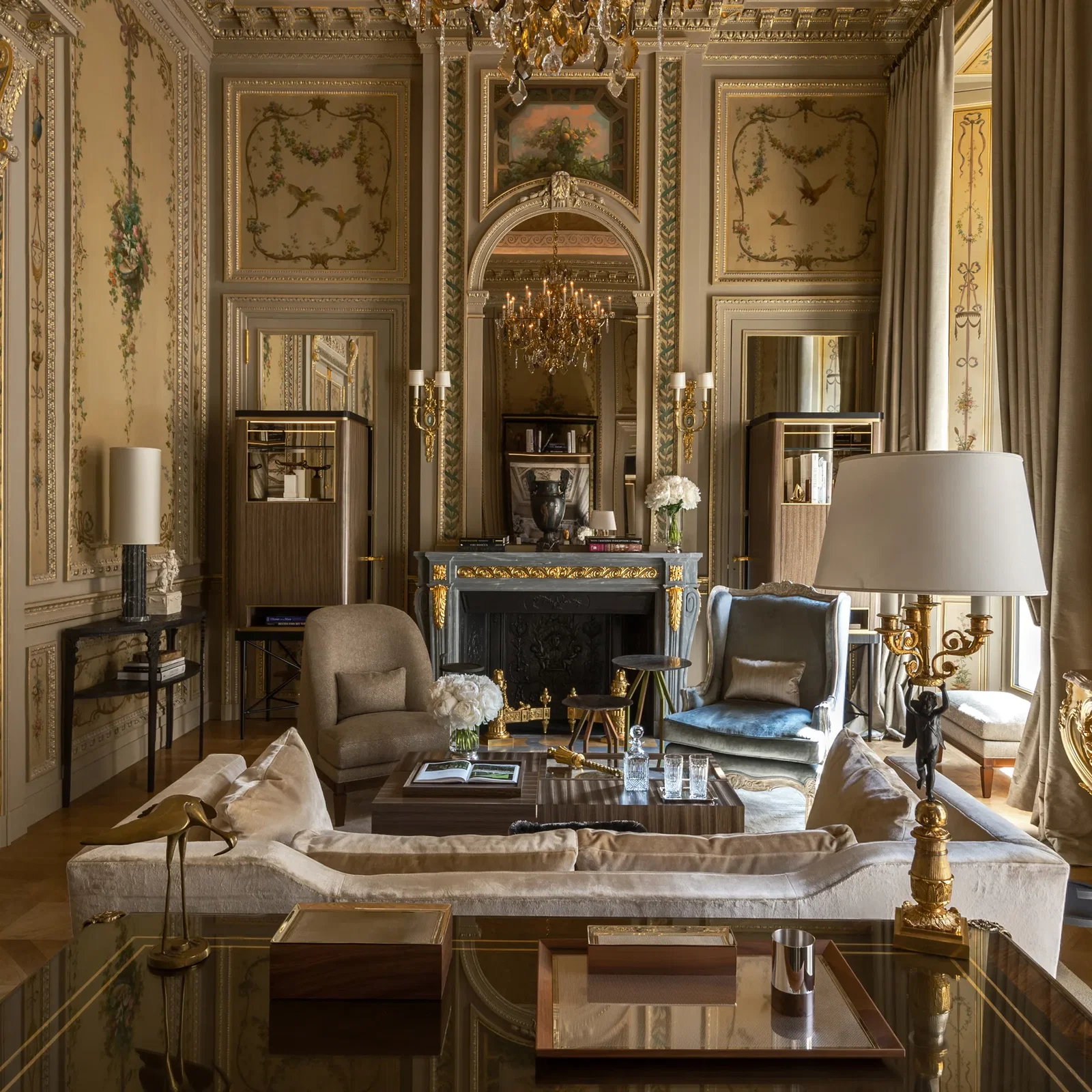 8. Hôtel de Crillon features exquisite hand-painted wall murals with birds and floral motifs.