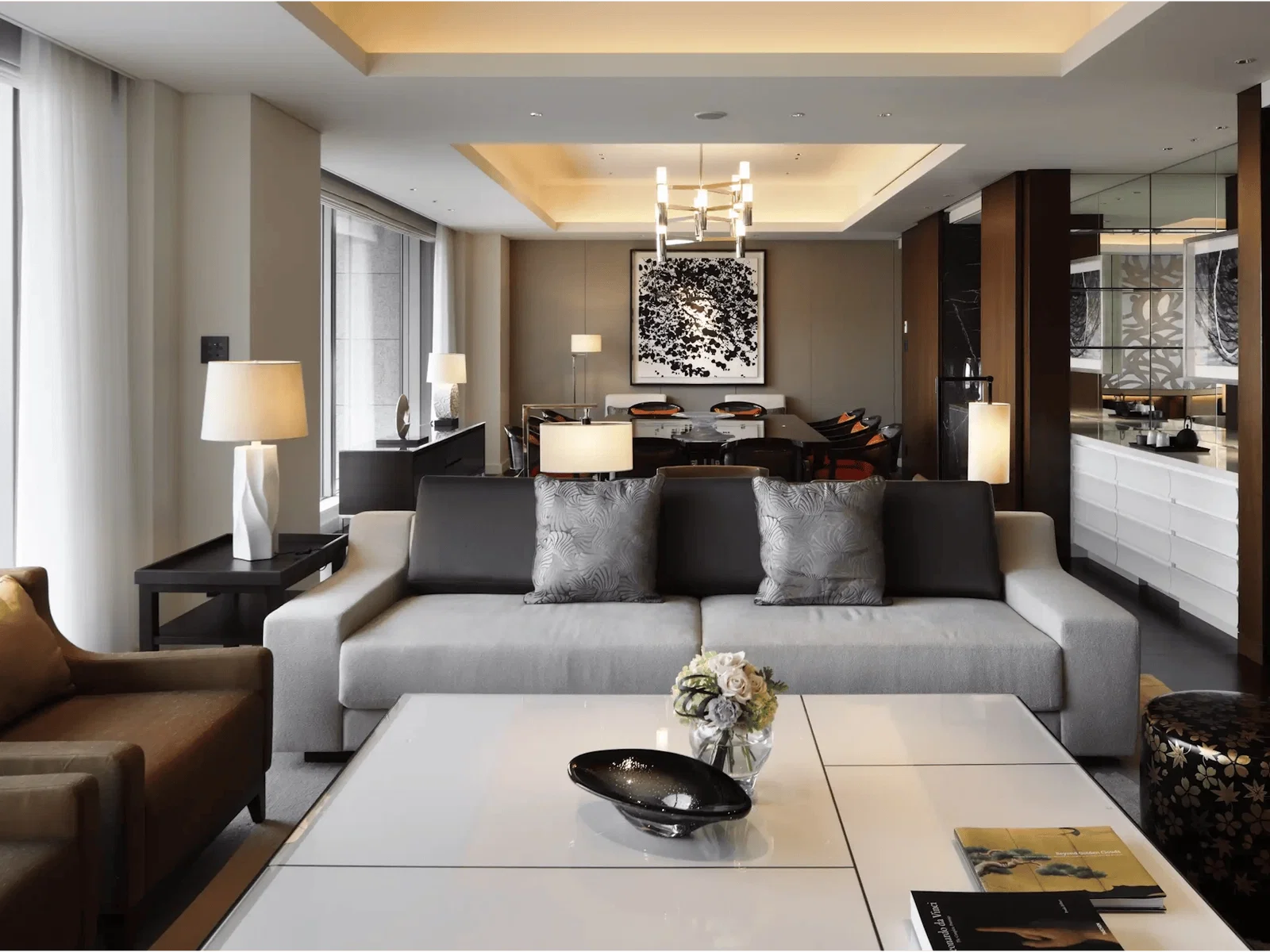 10. Palace Hotel Tokyo displays a bold black and white abstract painting above the dining area.