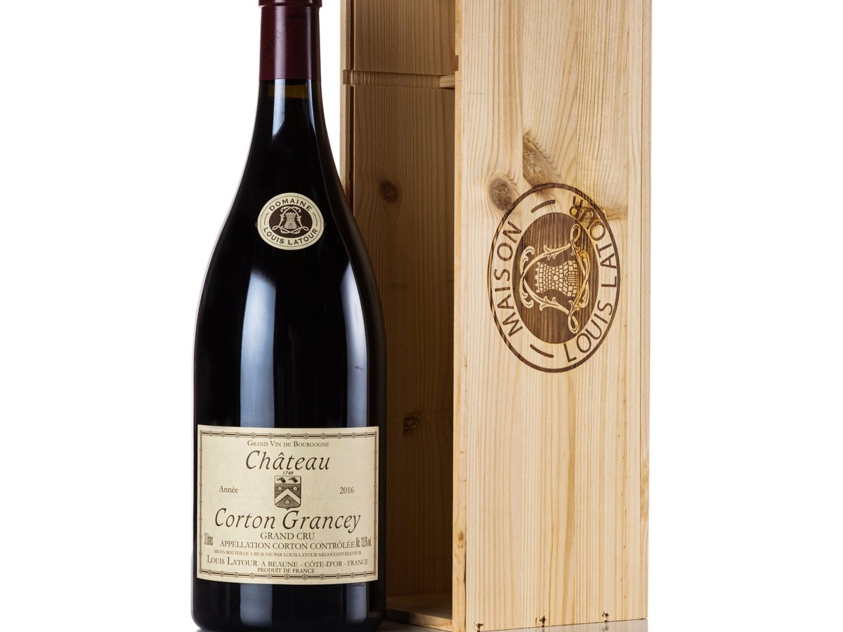 A single magnum bottle of Maison Louis Latour Château Corton Grancey Grand Cru 2016 in a wooden presentation box, confirmed by visible label text.