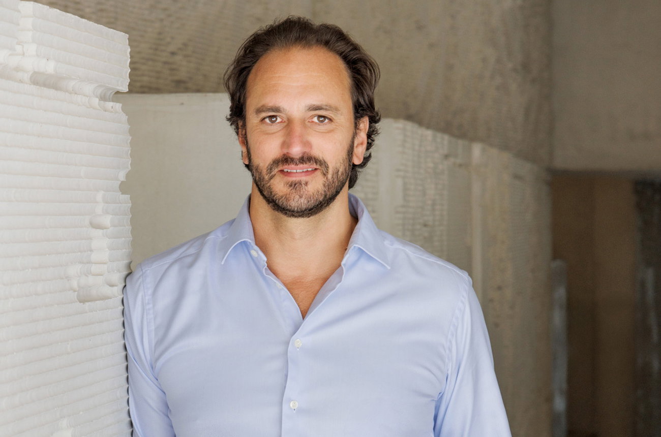 Edouard Moueix, third-generation owner of Etablissements Jean-Pierre Moueix, photographed in a cellar environment