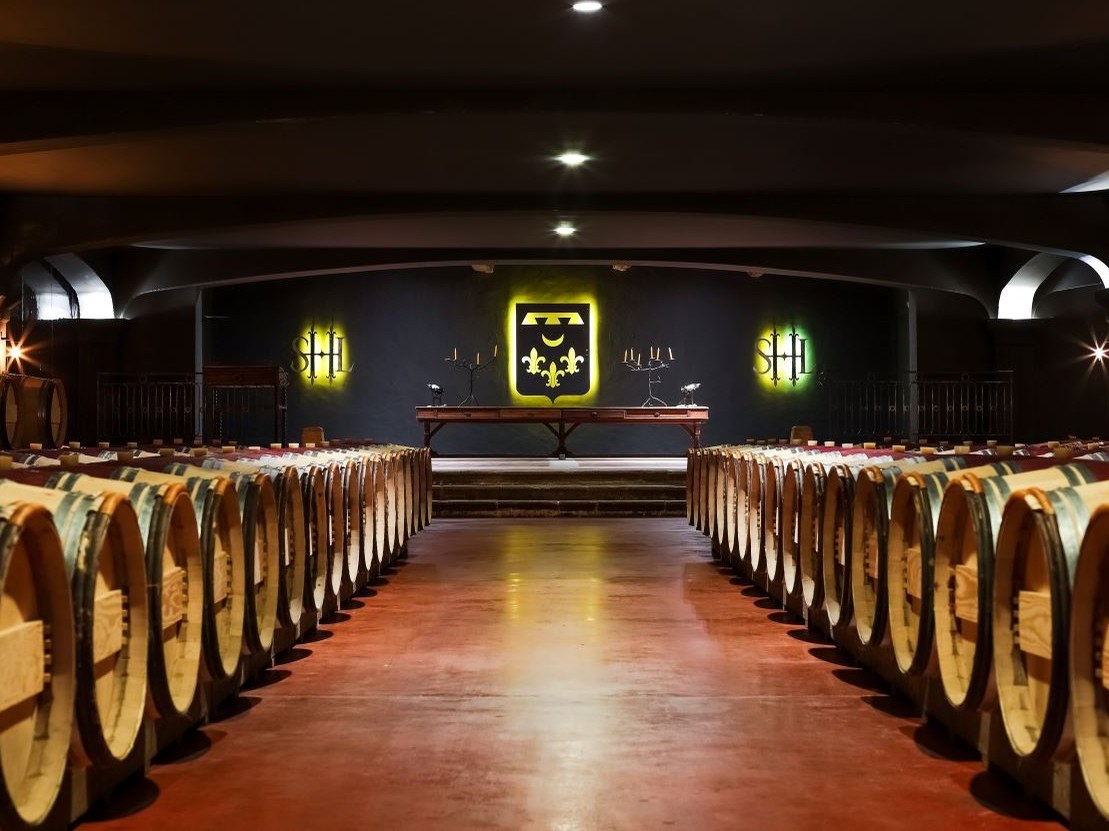 Château Smith Haut Lafitte's barrel cellar, a testament to Bordeaux's winemaking tradition.