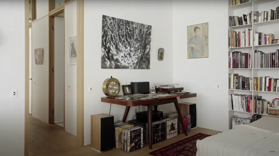 The Booking Channels That Actually Work, featuring a tall white bookshelf packed with books.