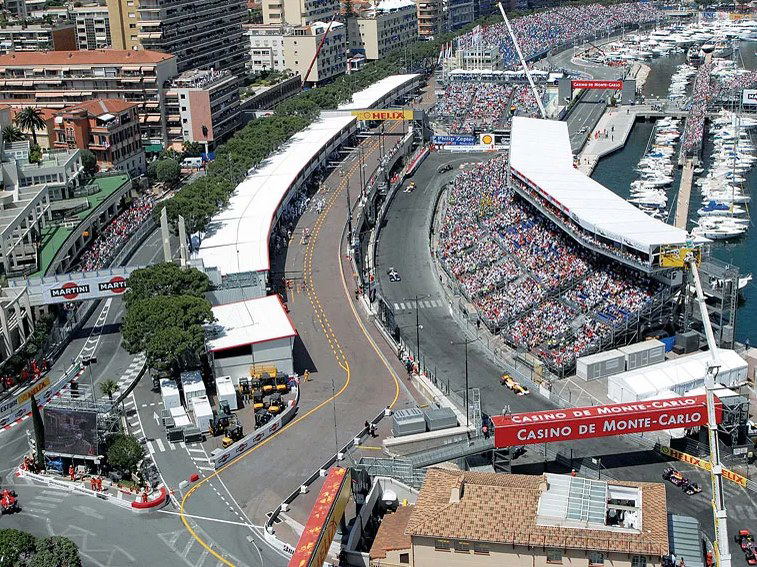 F1 paddock club at Monaco Grand Prix, where demand for exclusive access outpaces availability.