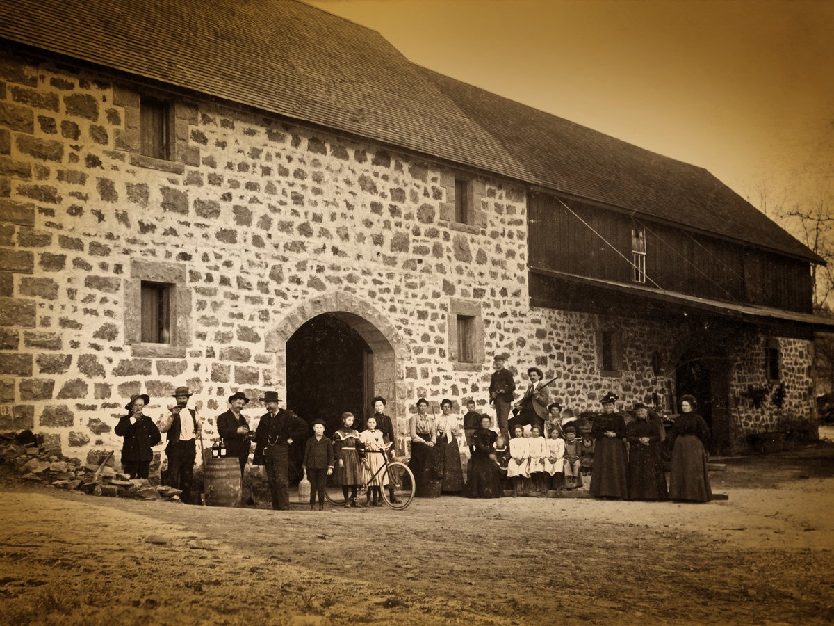 Château Vignelaure: A historic gathering outside the stone winery building.