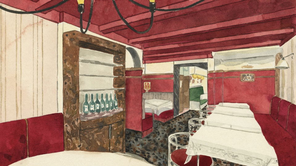 Basque Taberna (West Town) showcases a striking red beamed ceiling throughout its inviting interior.