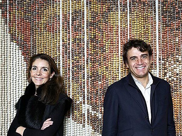Marta Seco and Sandro Silva, owners of Grupo Paraguas, pose for a portrait.
