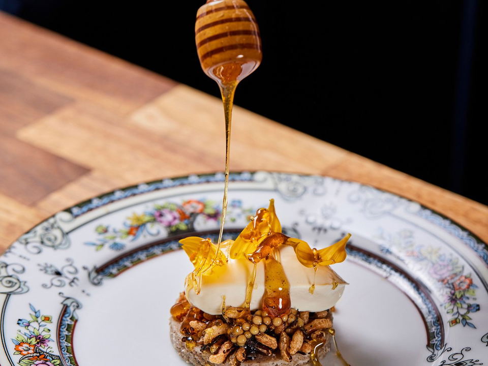 Curtis Stone's Maude: A contemporary dish with honey drizzled over nuts and cream.