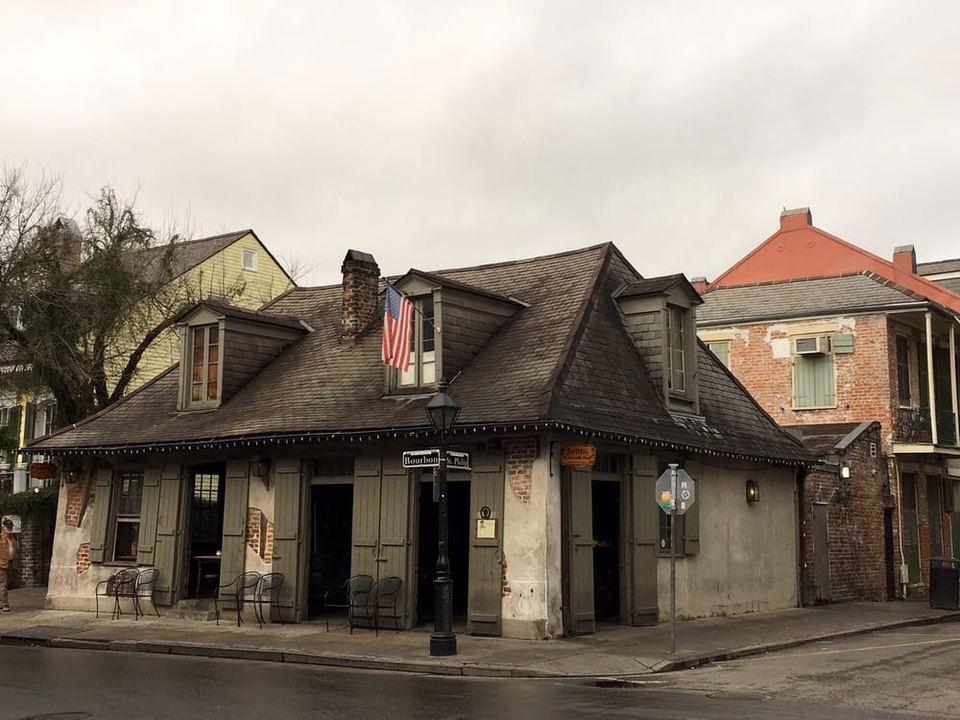 Bourbon St: A classic French Quarter bar exterior, perfect for The Cocktail Hour.