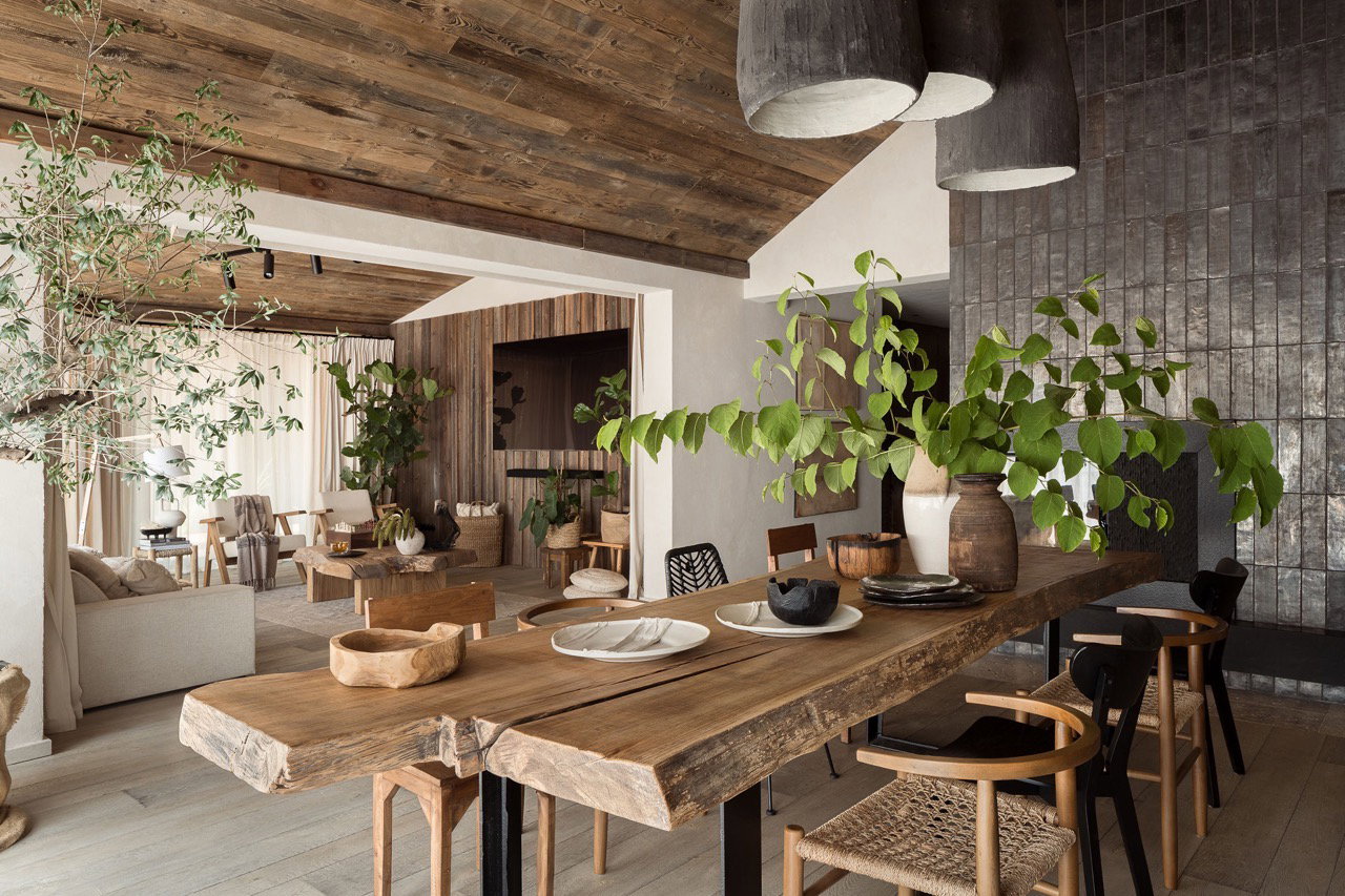 Environmental Practices and Culinary Philosophy features abundant green foliage throughout the natural space.