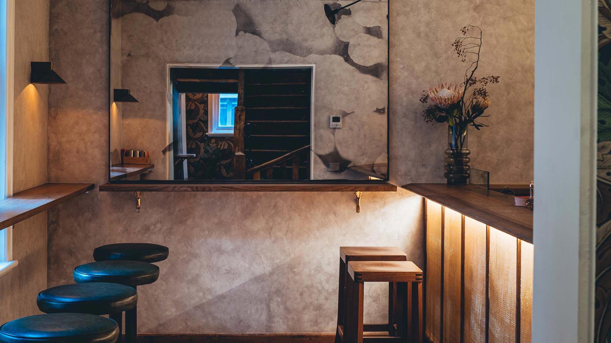 Drinking cocktails at Caretaker’s Cottage bar in Melbourne, Australia