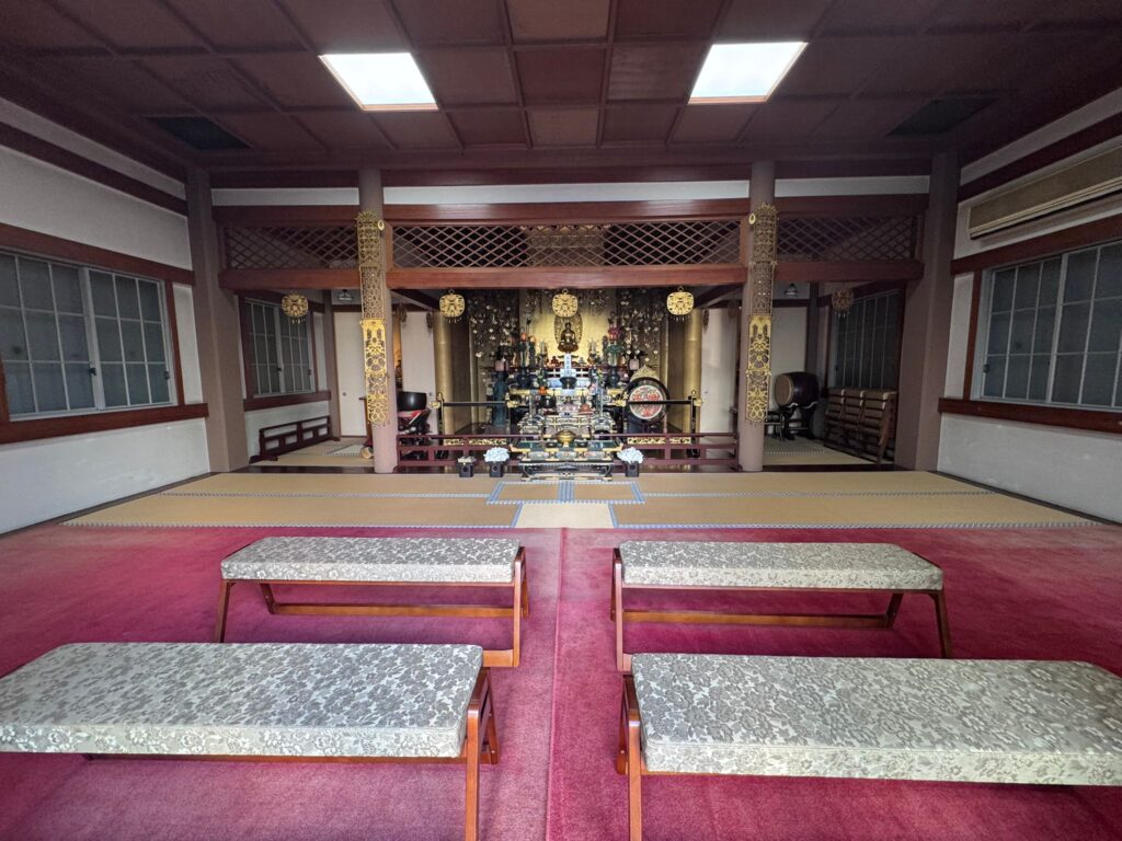 Practical Information for U.S. Visitors, featuring a golden, multi-tiered altar.