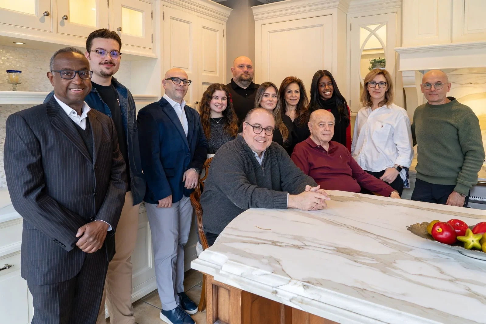 Service and Staff gather around a distinctive marble-top table.